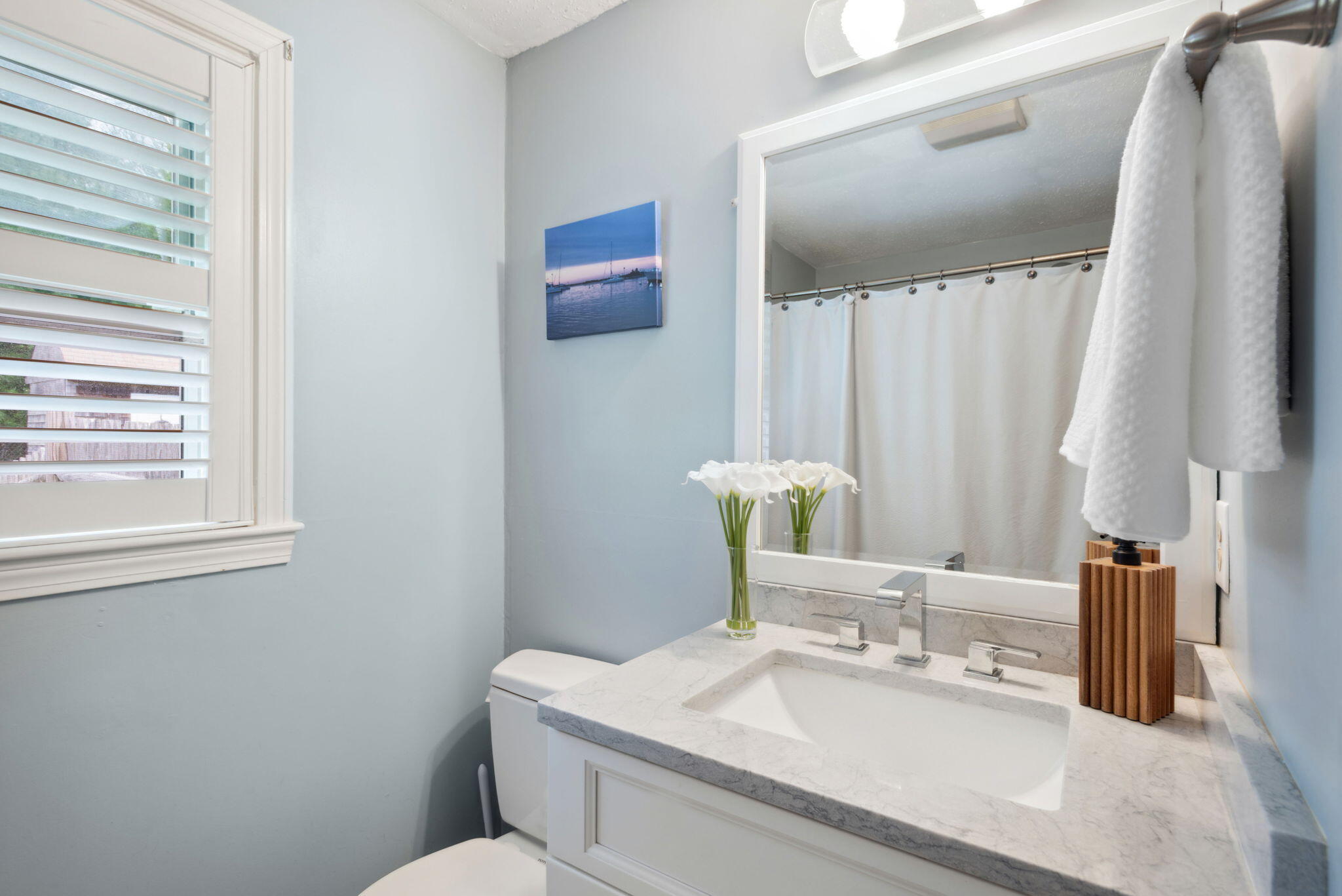 67 Degrass Road Mashpee, MA 02649 - Photo 13 of 24 a bathroom with a granite countertop sink and a mirror