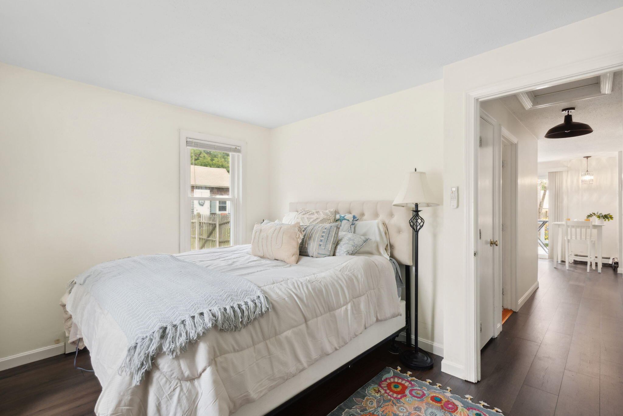 67 Degrass Road Mashpee, MA 02649 - Photo 14 of 24 a bedroom with a bed and a window