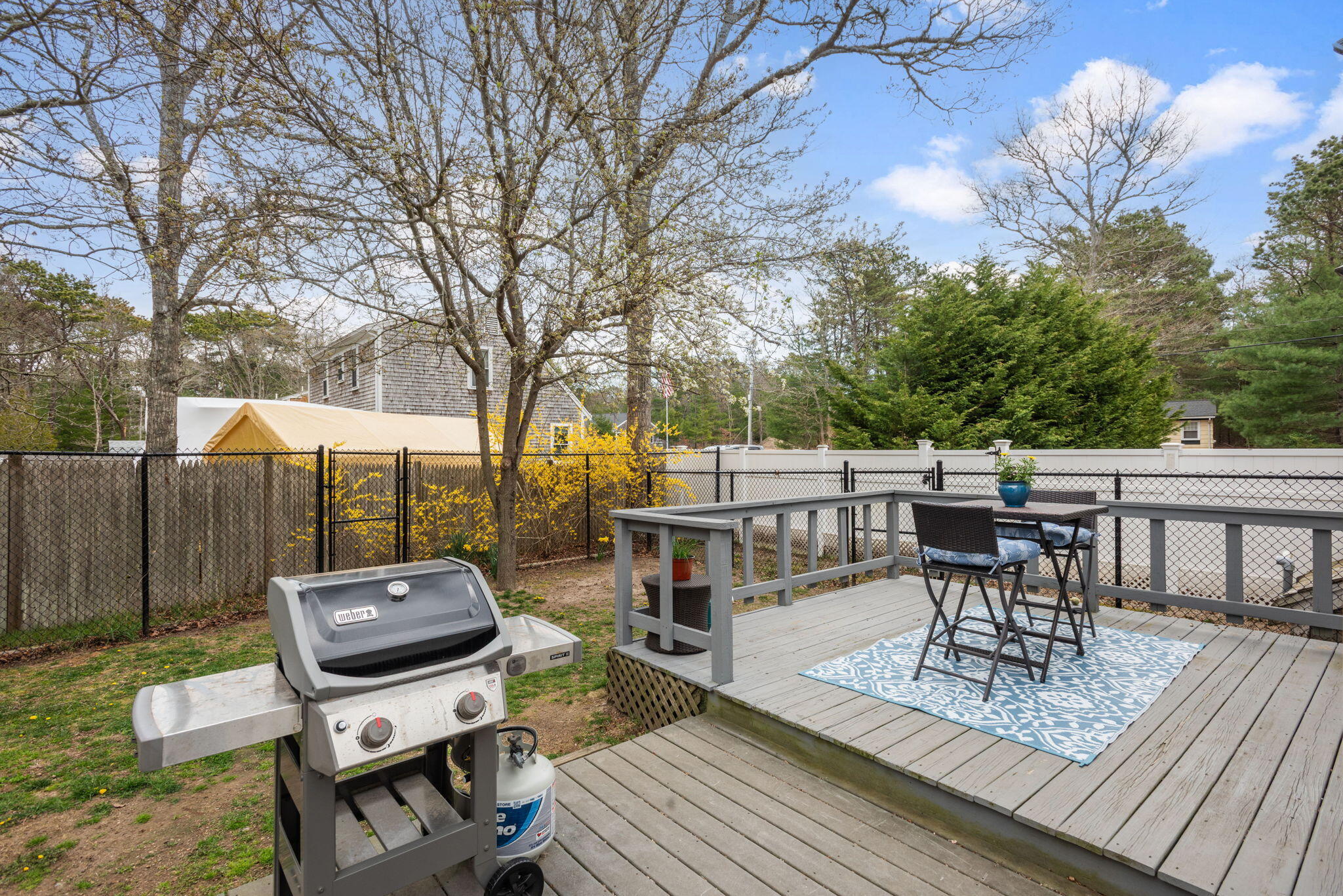 67 Degrass Road Mashpee, MA 02649 - Photo 19 of 24 a view of a chairs and table on the roof deck