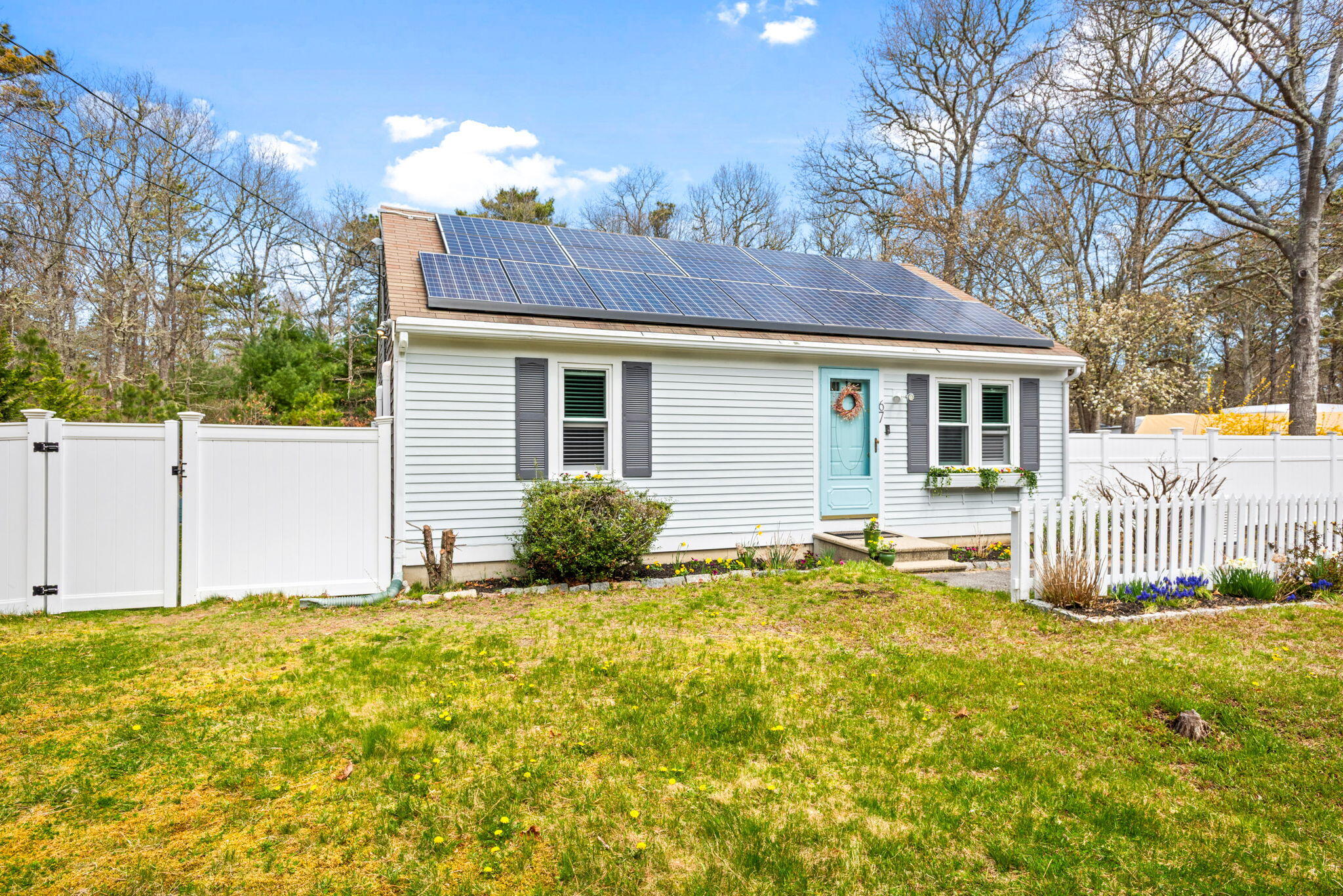 67 Degrass Road Mashpee, MA 02649 - Photo 2 of 24 a house view with a garden space