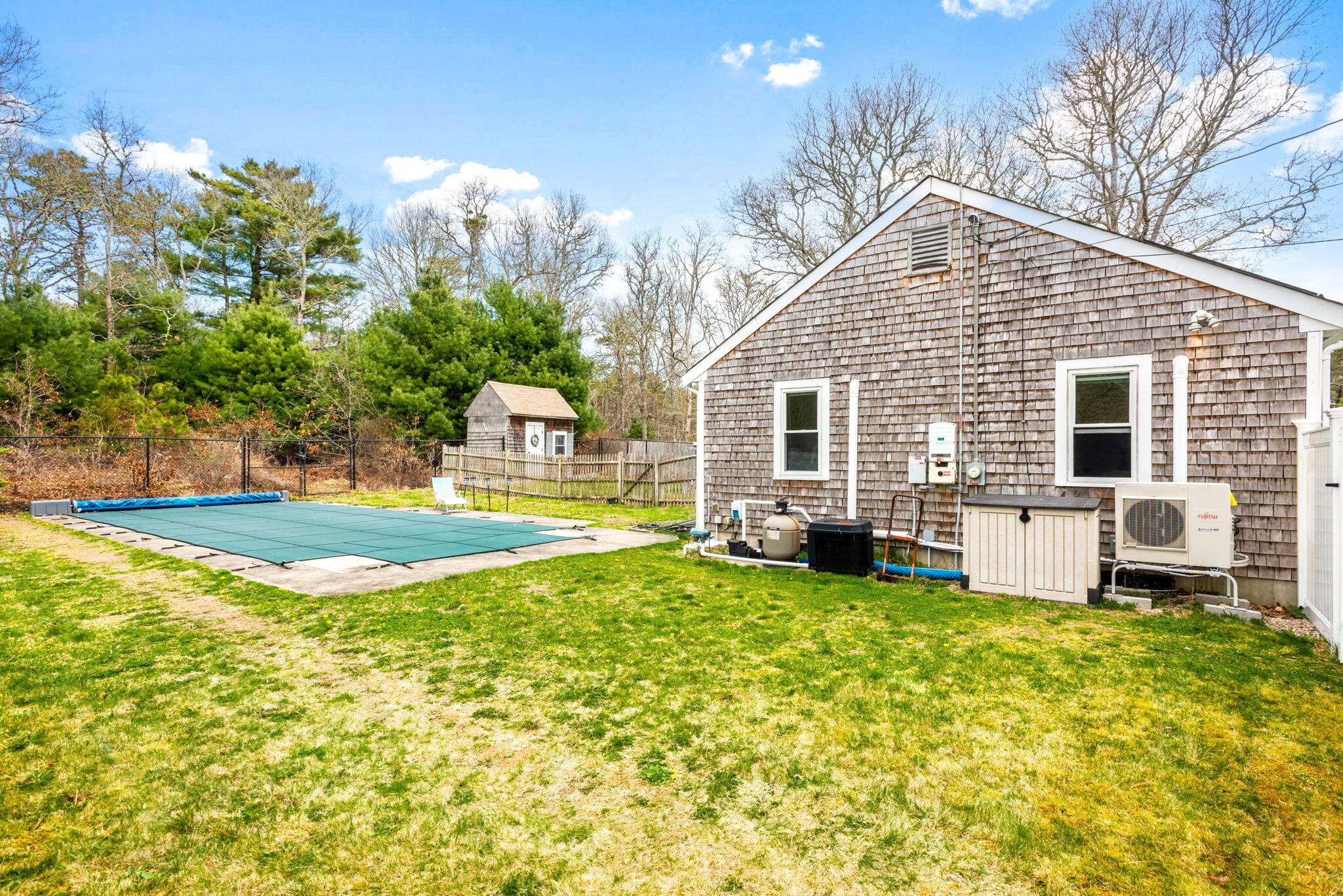 67 Degrass Road Mashpee, MA 02649 - Photo 21 of 24 a view of a house with a yard