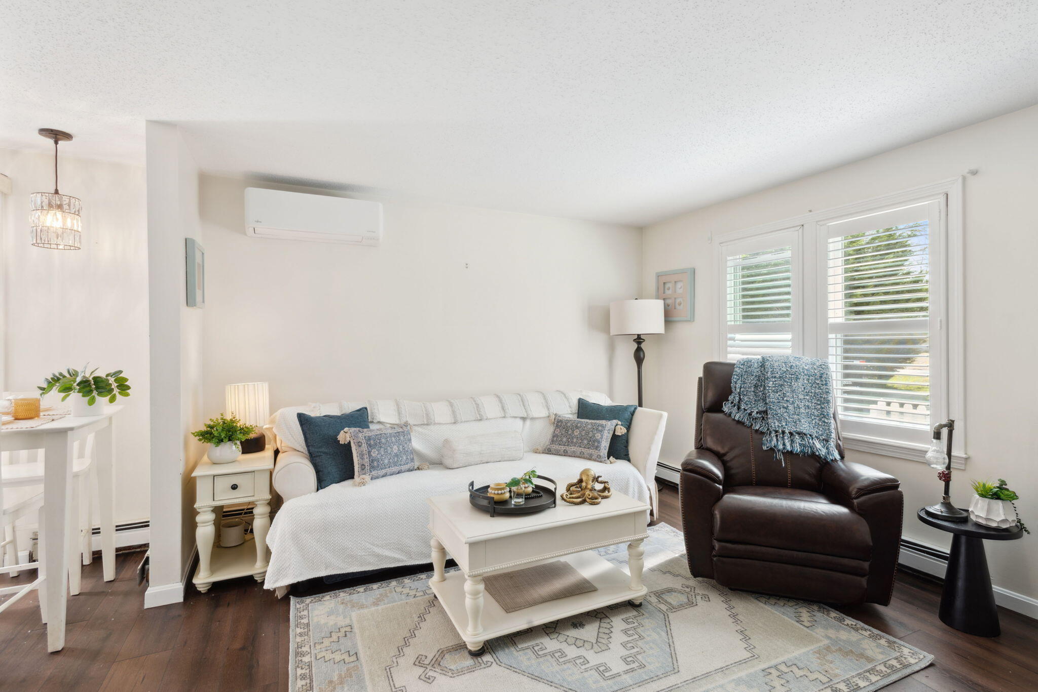 67 Degrass Road Mashpee, MA 02649 - Photo 6 of 24 a living room with furniture and wooden floor