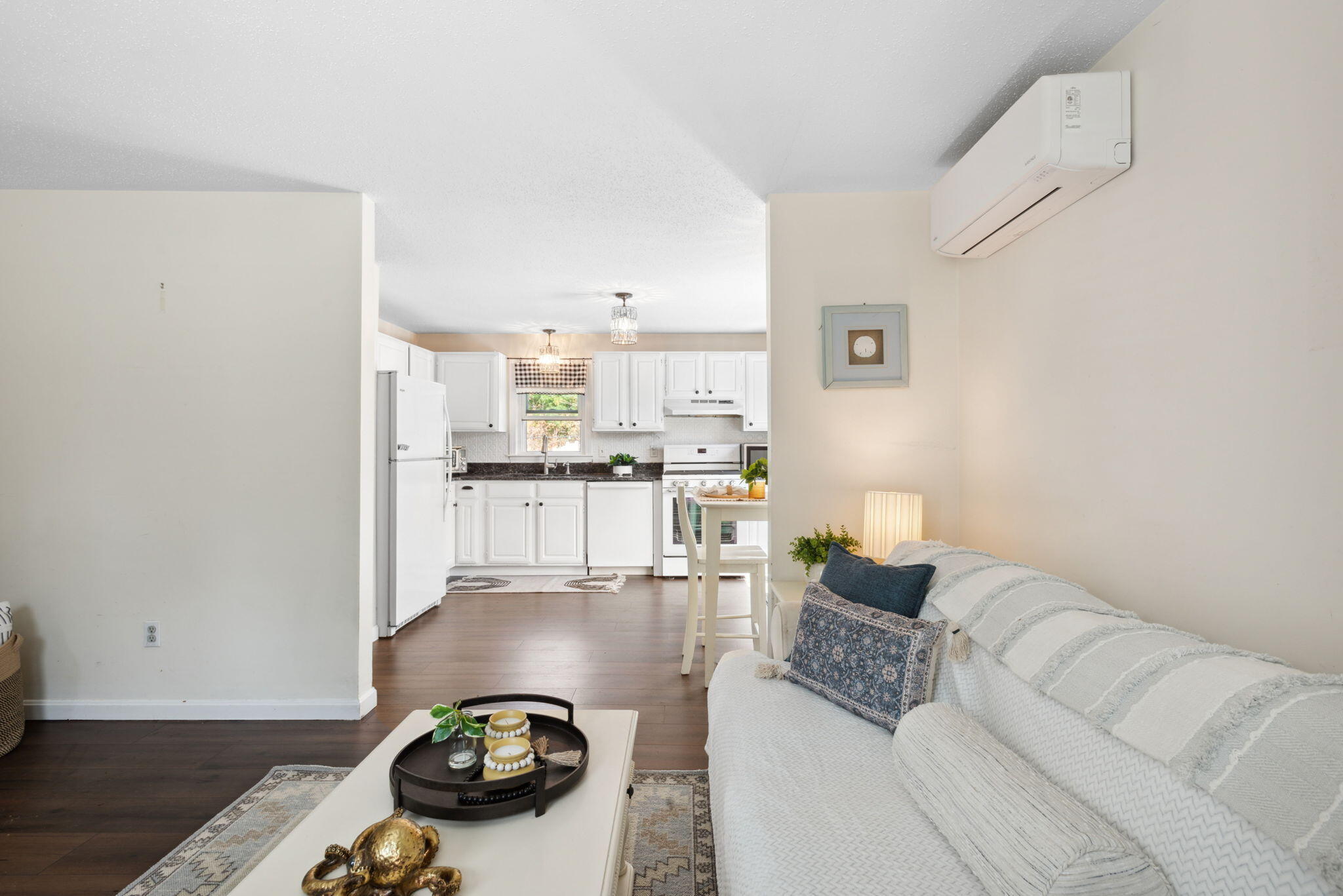 67 Degrass Road Mashpee, MA 02649 - Photo 7 of 24 a living room with furniture and kitchen view