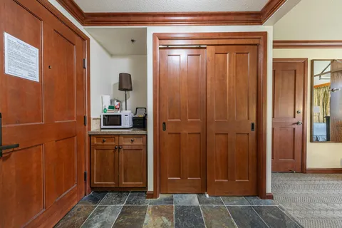 a bathroom with a shower and a sink