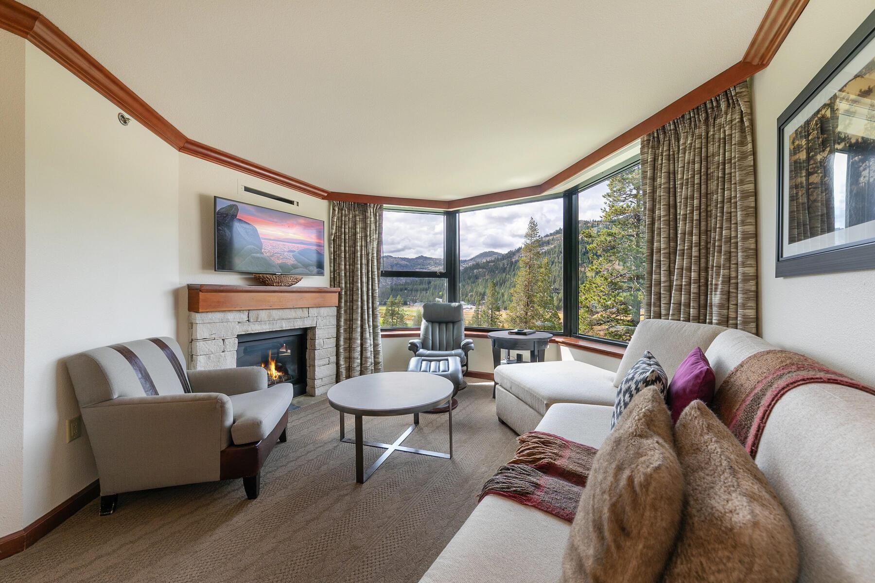 400 Resort Road, Unit 722724 Olympic Valley, CA 96146 - Photo 18 of 28 a living room with furniture and a fireplace
