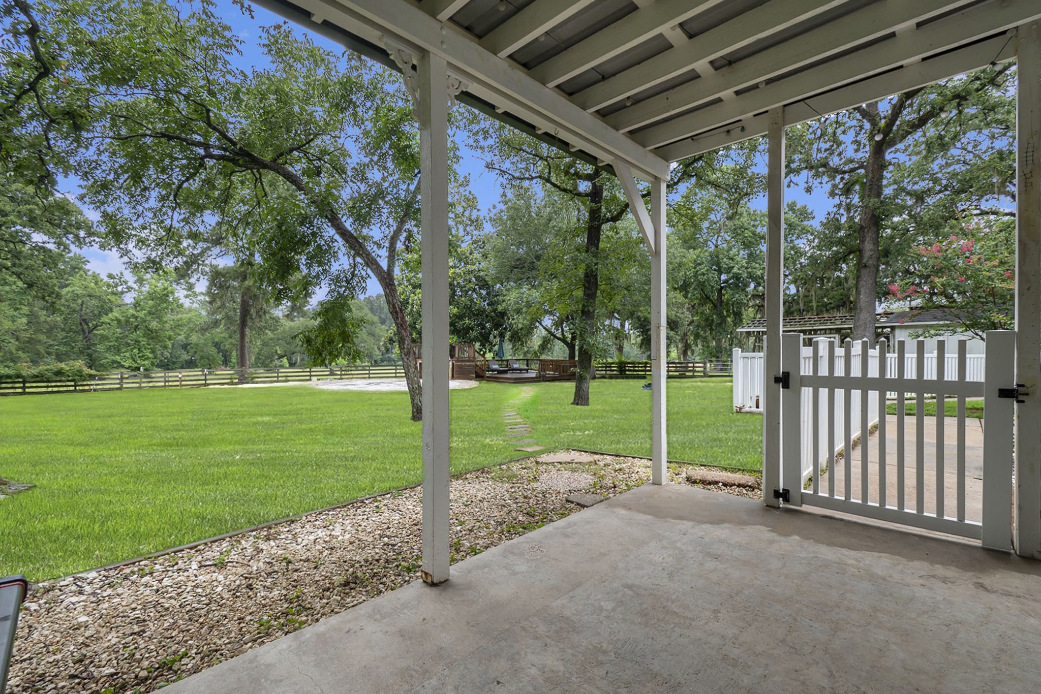7363 County Line Road Willis, TX 77378 - Photo 18 of 34 Back Patio great for entertaining and watching livestock