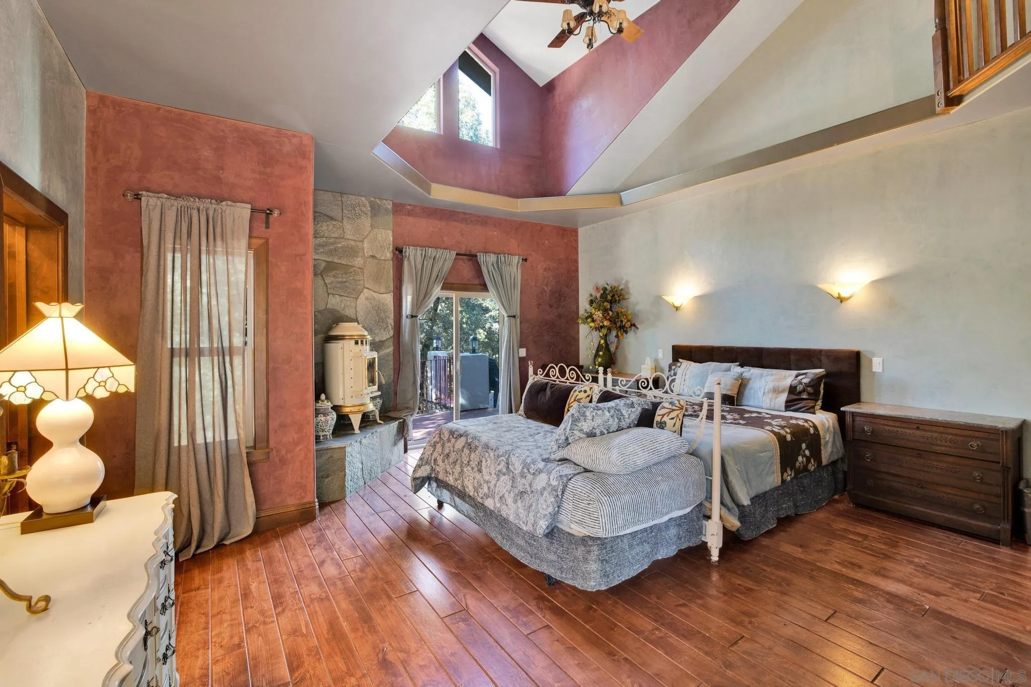 3217 Pera Alta Drive Julian, CA 92036 - Photo 20 of 37 a spacious bedroom with a bed and large windows