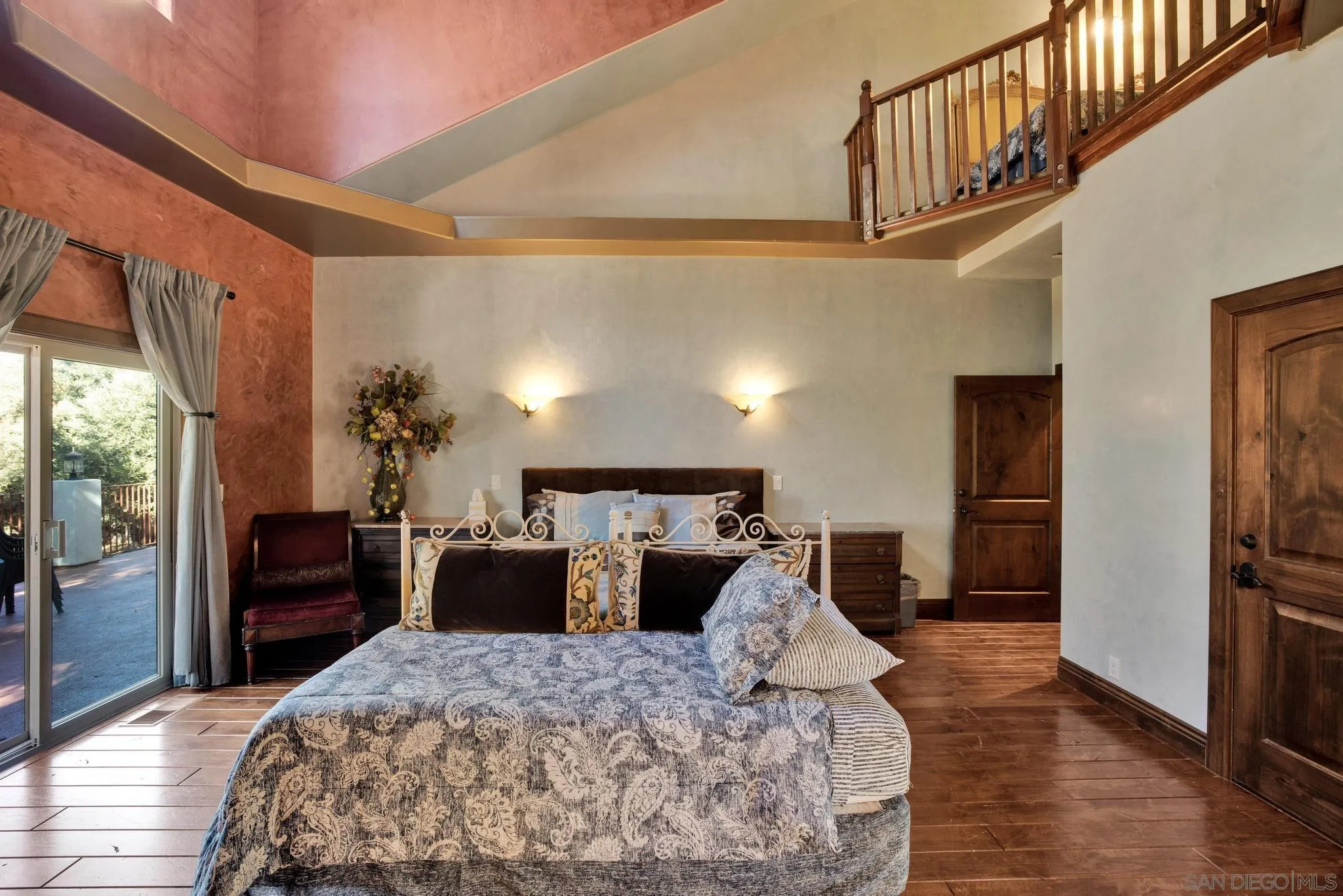 3217 Pera Alta Drive Julian, CA 92036 - Photo 21 of 37 a large bedroom with wooden floor and furniture