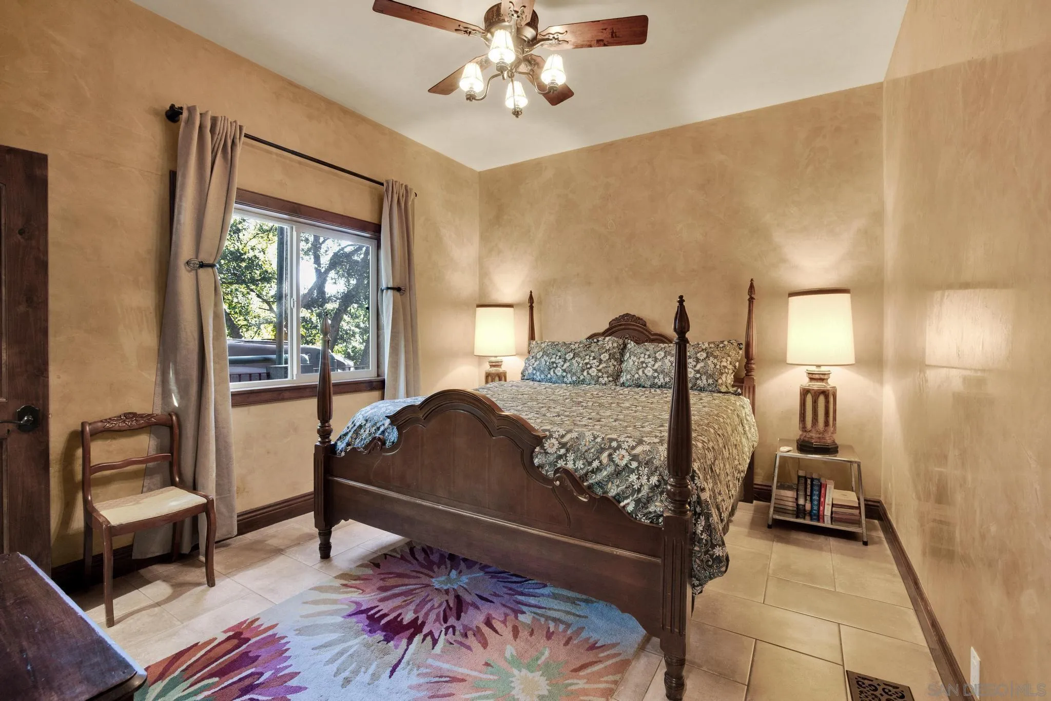 3217 Pera Alta Drive Julian, CA 92036 - Photo 22 of 37 a bedroom with a bed and wooden floor