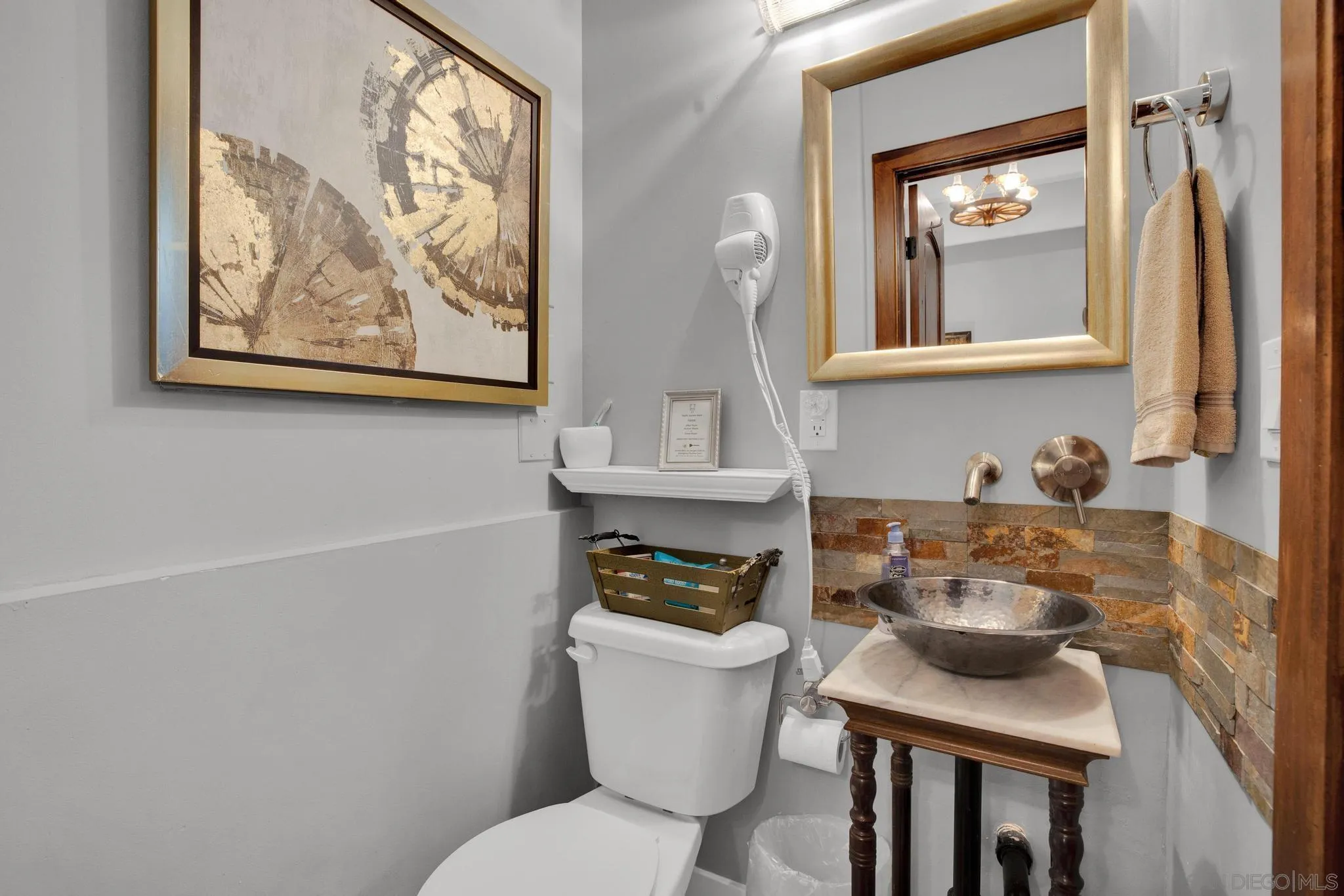 3217 Pera Alta Drive Julian, CA 92036 - Photo 29 of 37 a bathroom with a toilet a sink and mirror