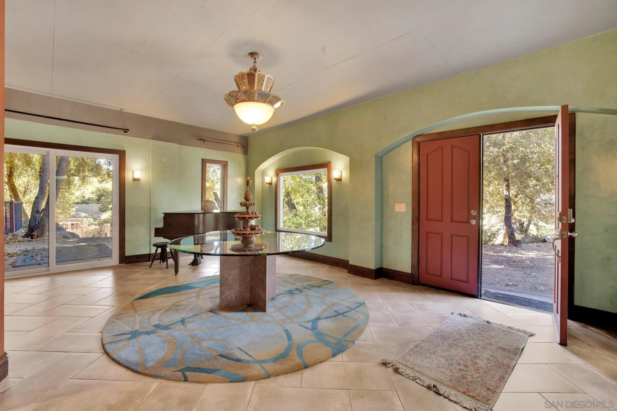 3217 Pera Alta Drive Julian, CA 92036 - Photo 8 of 37 a view of a livingroom with furniture wooden floor and windows