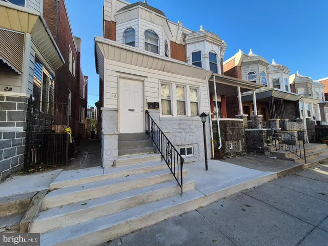 a view of a building with a porch