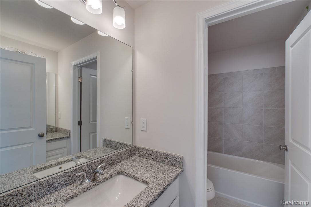 51056 Rockingham Drive Canton, MI 48188 - Photo 5 of 23 bathroom.jpg