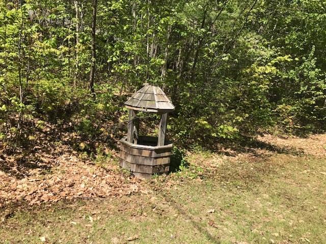 52 Arundel Road Raymond, ME 04071 - Photo 20 of 31 Drilled well under wishing well