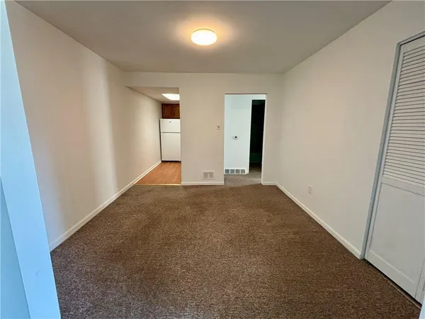 an empty room with a natural light