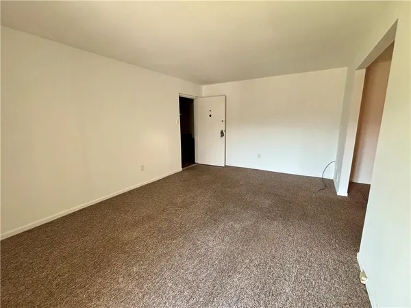 an empty room with a natural light