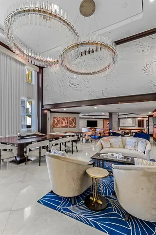 a view of a building with sitting area