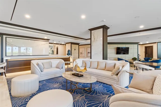 a view of a backyard and swimming pool