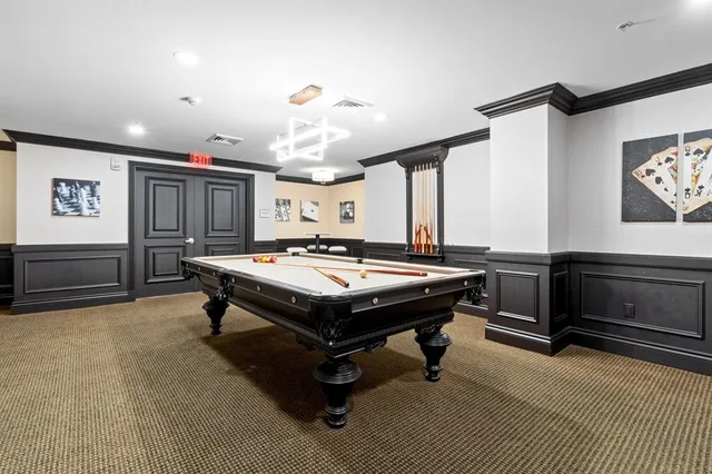 a workspace with furniture and a window