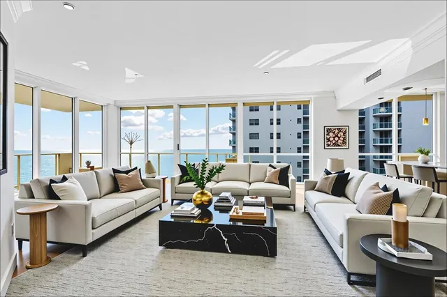 a bedroom with a bed couch and window