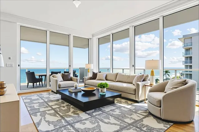 a bathroom with a glass shower door and a window