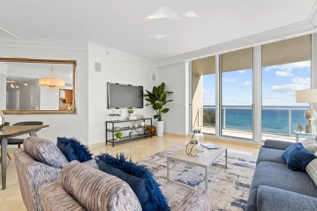 a bathroom with a double vanity sink mirror and shower