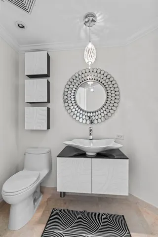 a view of a patio with table and chairs potted plants