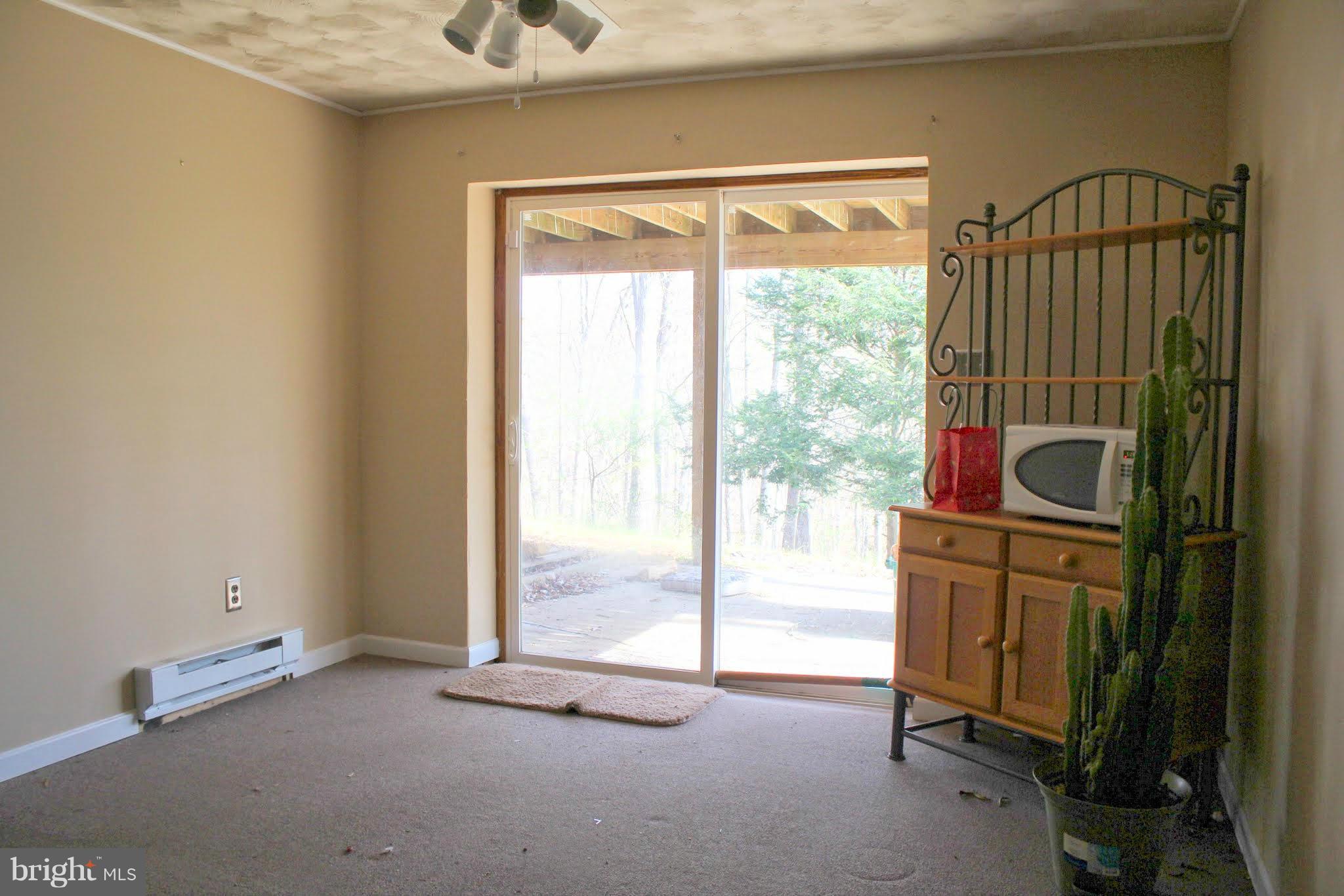 2416 Raintree Avenue Westminster, MD 21157 - Photo 23 of 27 an empty room with windows