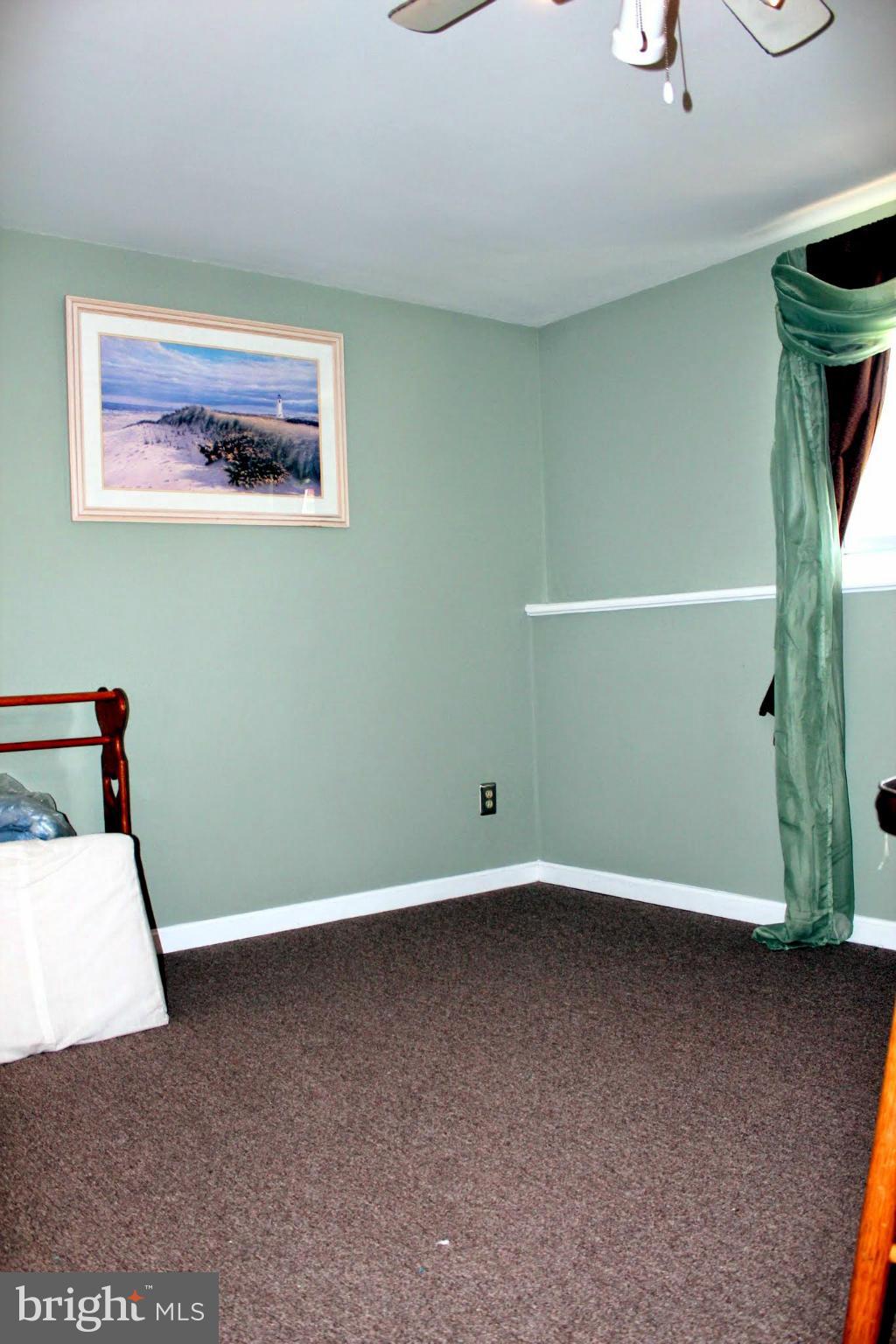 2416 Raintree Avenue Westminster, MD 21157 - Photo 26 of 27 a view of a room with wooden wall
