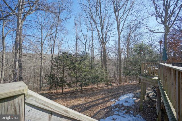 2416 Raintree Avenue Westminster, MD 21157 - Photo 4 of 27 a view of a yard with iron fence