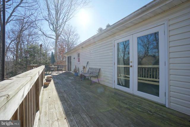 2416 Raintree Avenue Westminster, MD 21157 - Photo 6 of 27 a view of a house with backyard and deck