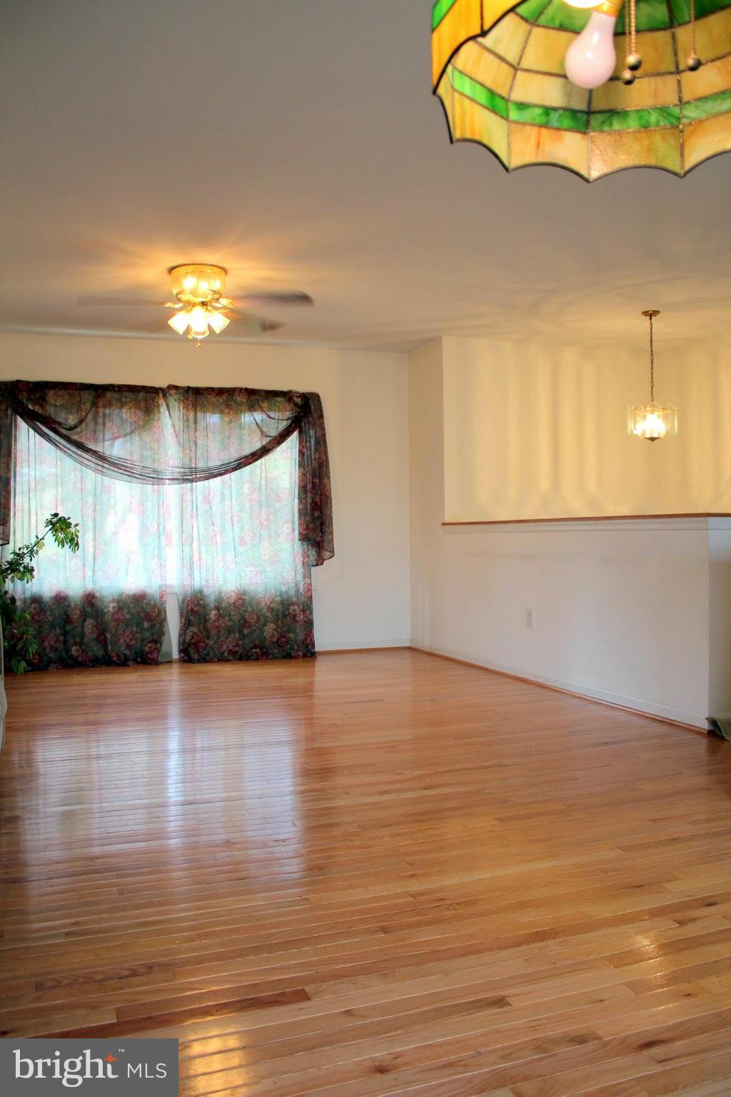 2416 Raintree Avenue Westminster, MD 21157 - Photo 10 of 27 a view of a room with wooden floor