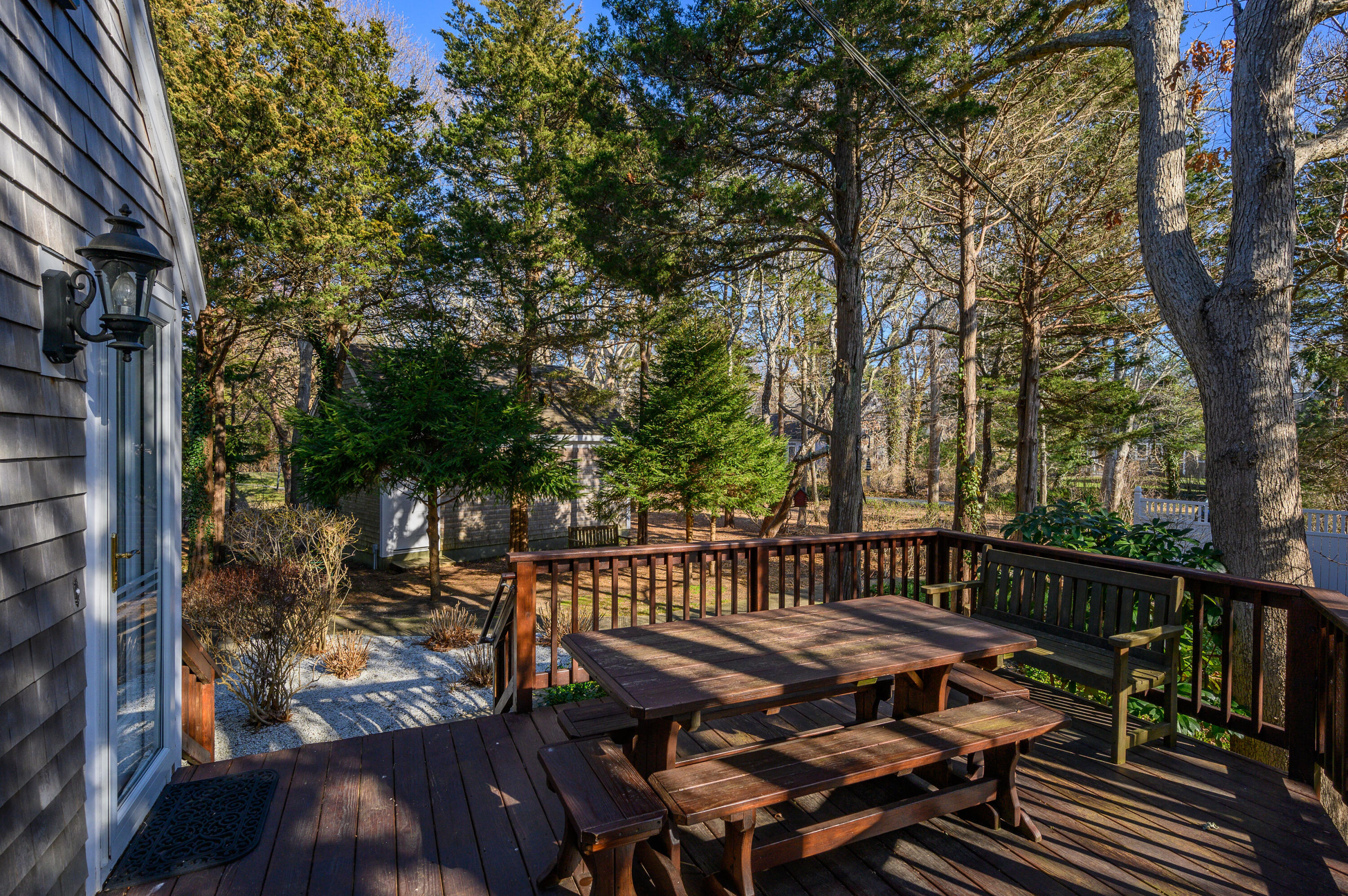 24 Blueberry Island Road Orleans, MA 02653 - Photo 27 of 39 a view of balcony with wooden floor and outdoor seating