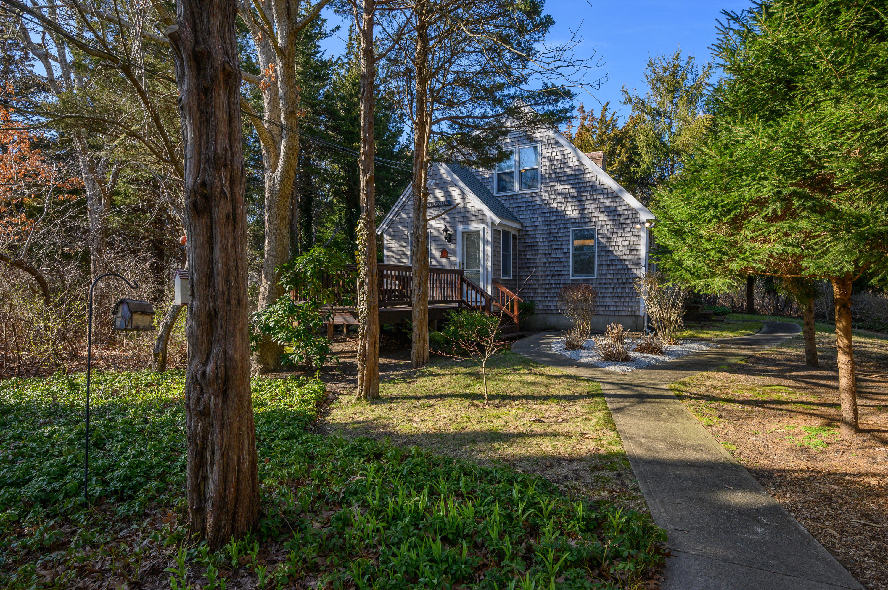 24 Blueberry Island Road Orleans, MA 02653 - Photo 3 of 39 a view of a house with swimming pool