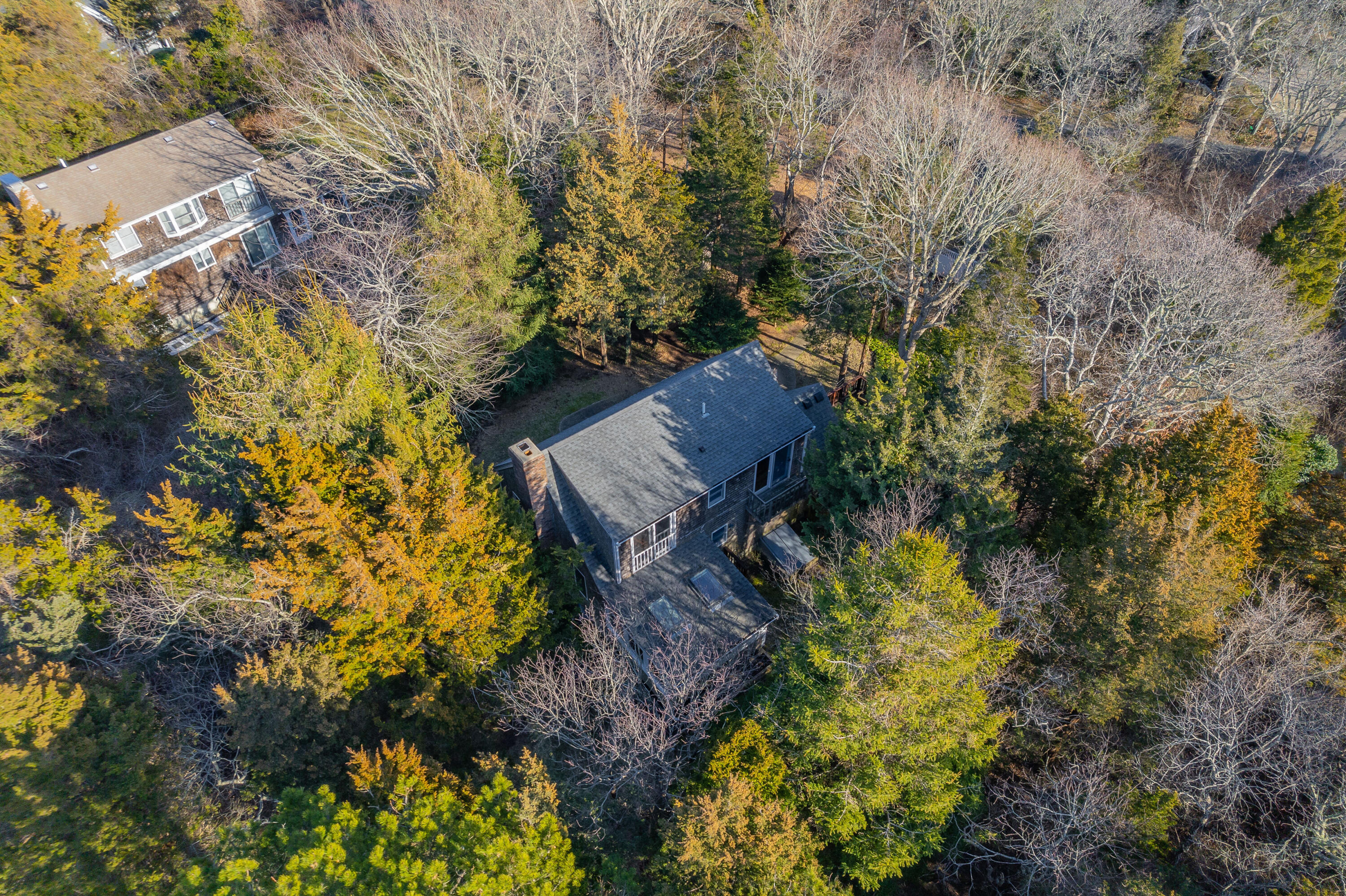 24 Blueberry Island Road Orleans, MA 02653 - Photo 32 of 39 a view of a house with a yard