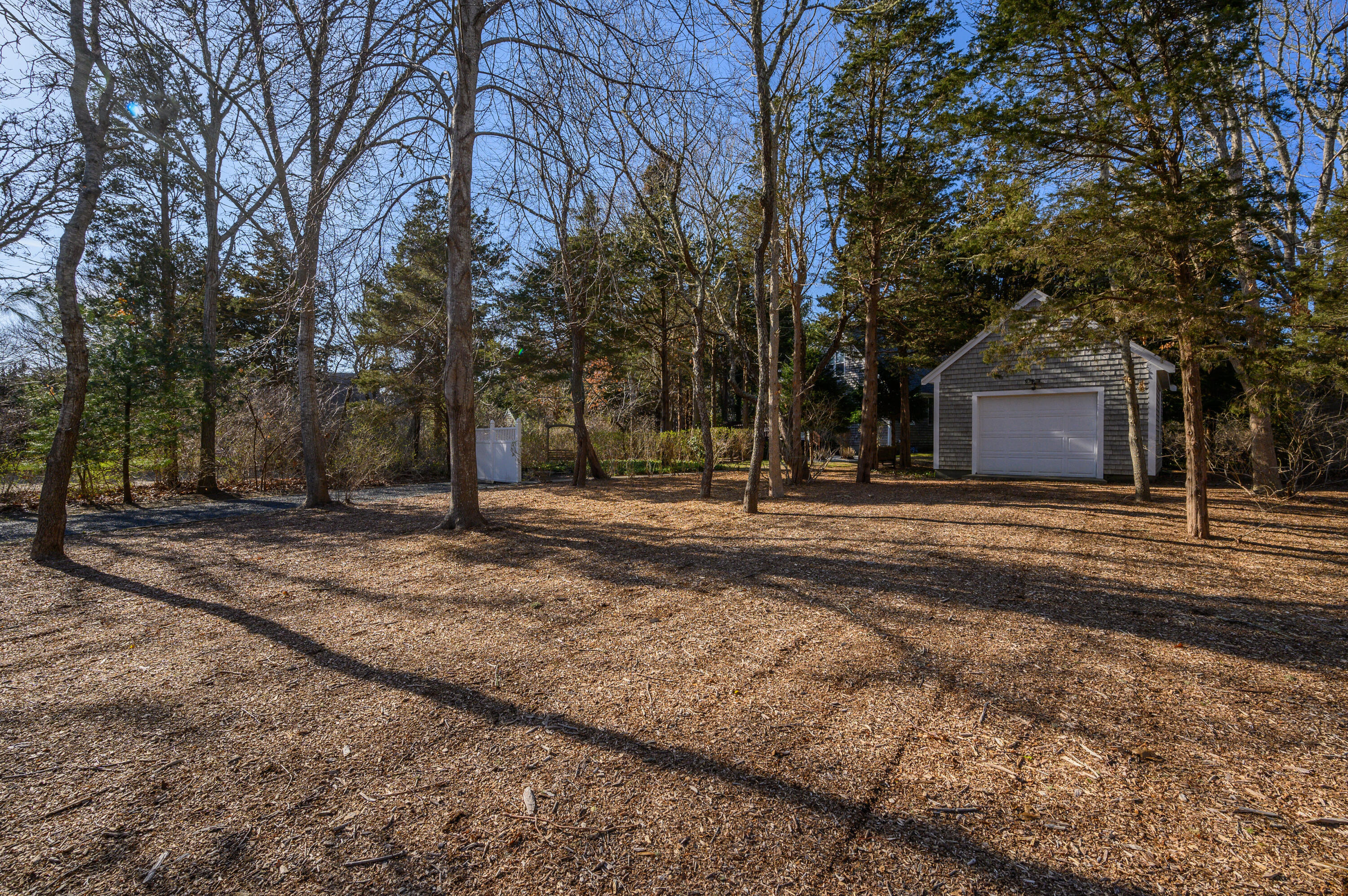 24 Blueberry Island Road Orleans, MA 02653 - Photo 33 of 39 a house with trees in front of it