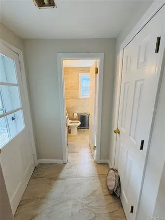 a view of a bathroom from a room
