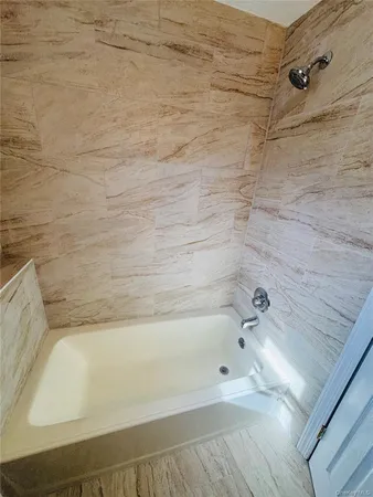 a bathroom with a bathtub