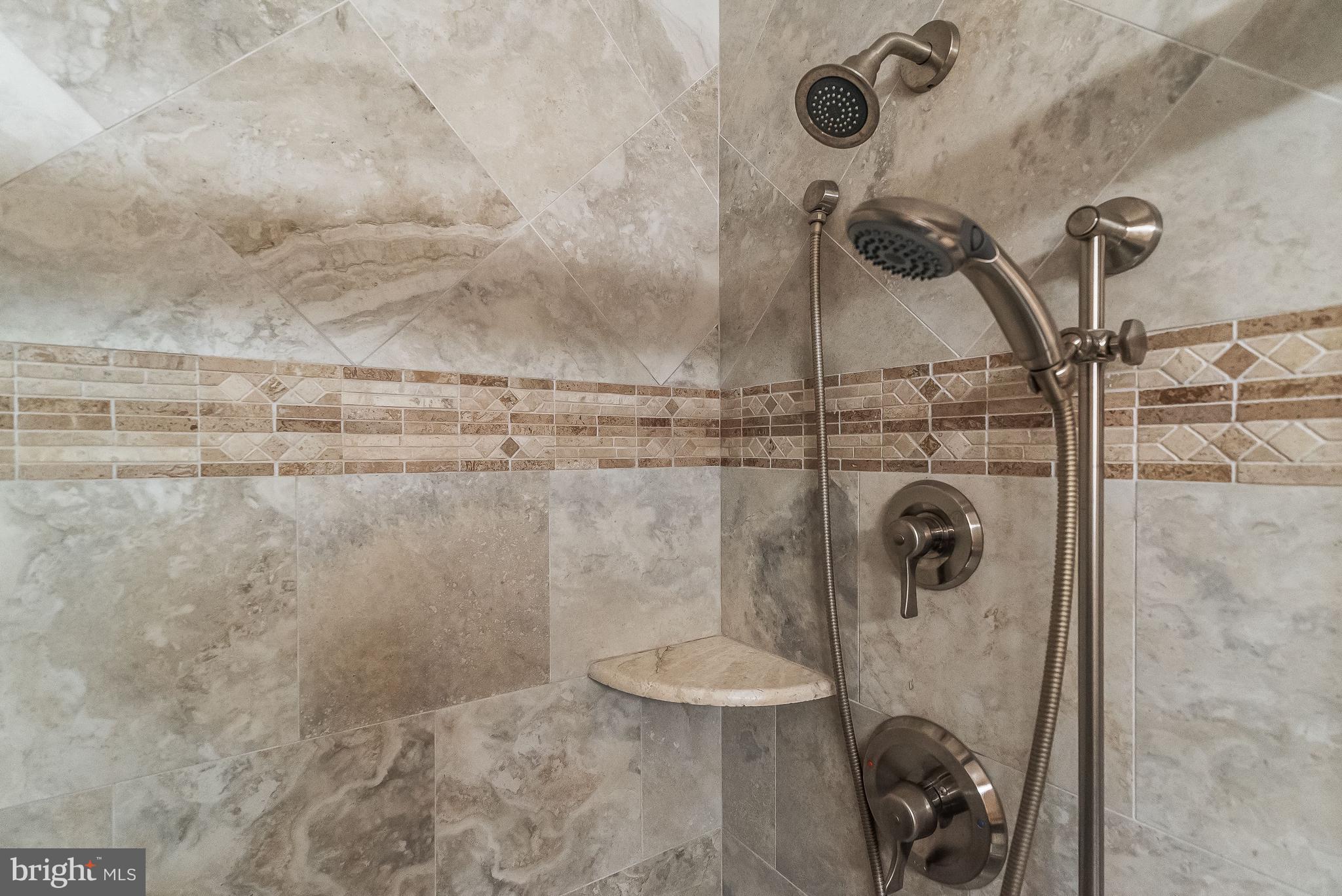 7369 Swan Point Way, Unit 109 Columbia, MD 21045 - Photo 23 of 65 Oversized shower with built-in seating
