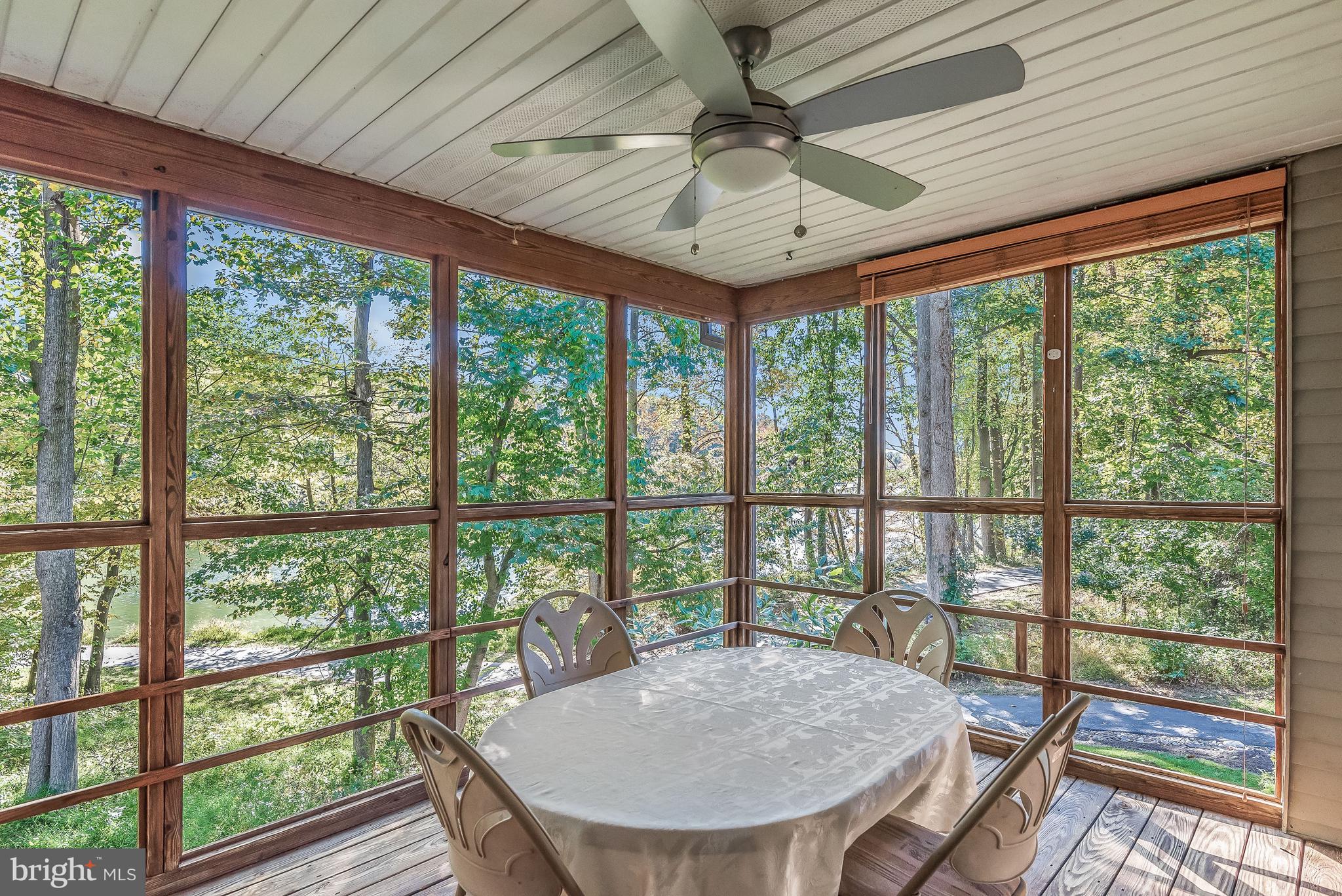7369 Swan Point Way, Unit 109 Columbia, MD 21045 - Photo 32 of 65 Screened Porch offers lake view