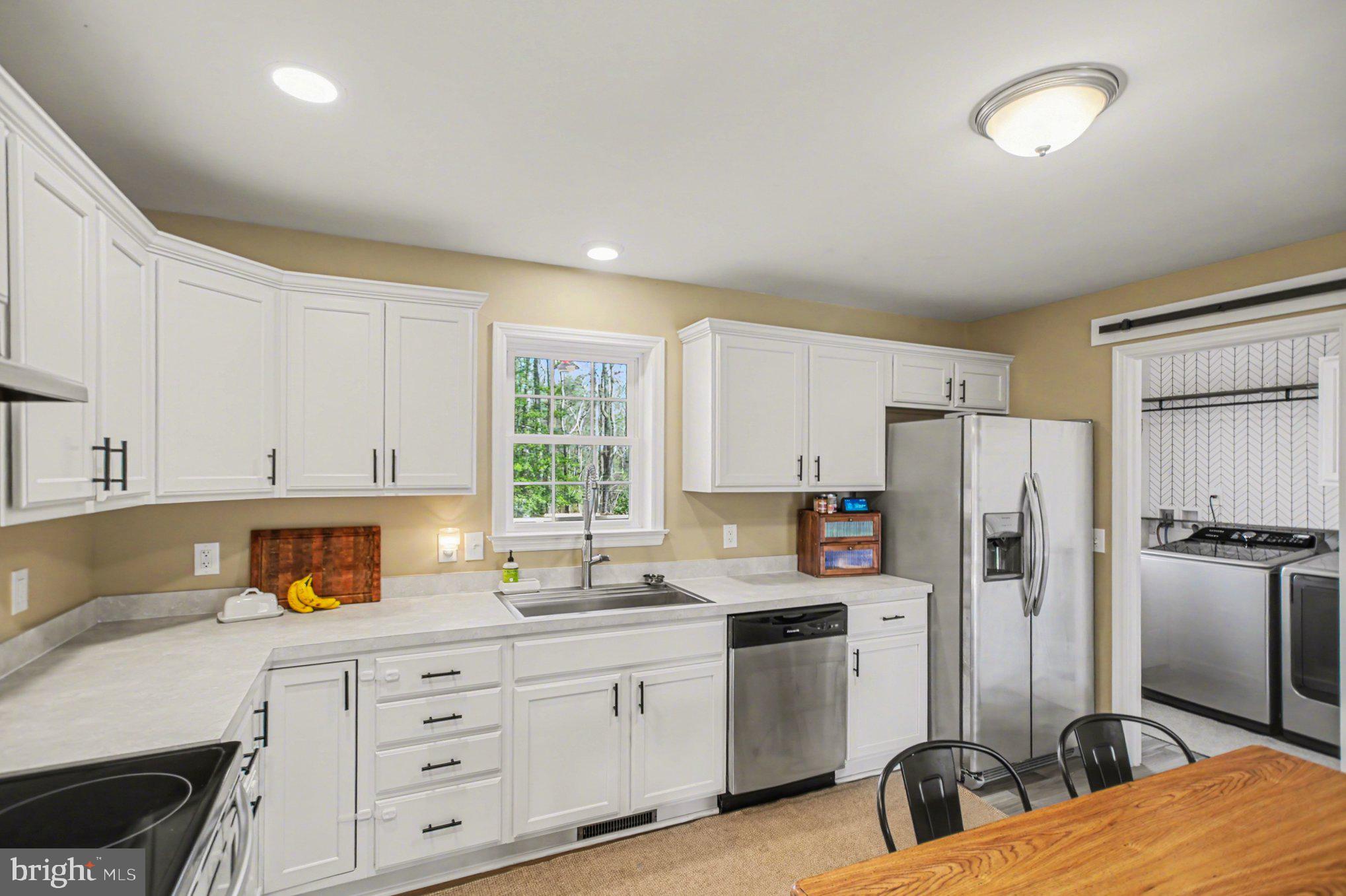 261 Azure Drive Colonial Beach, VA 22443 - Photo 12 of 44 Lots of cabinets in the kitchen!