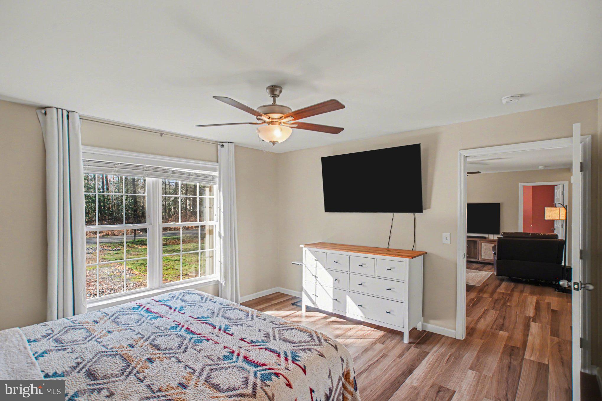 261 Azure Drive Colonial Beach, VA 22443 - Photo 19 of 44 Large primary bedroom with lots of natural light