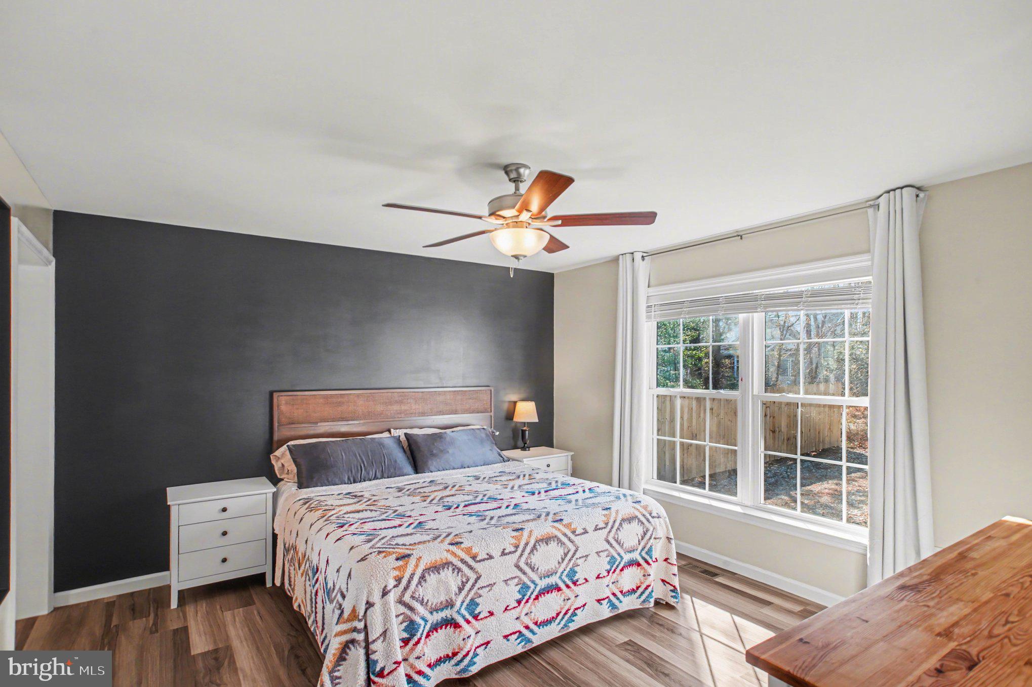 261 Azure Drive Colonial Beach, VA 22443 - Photo 4 of 44 Natural sunlight in the large primary bedroom