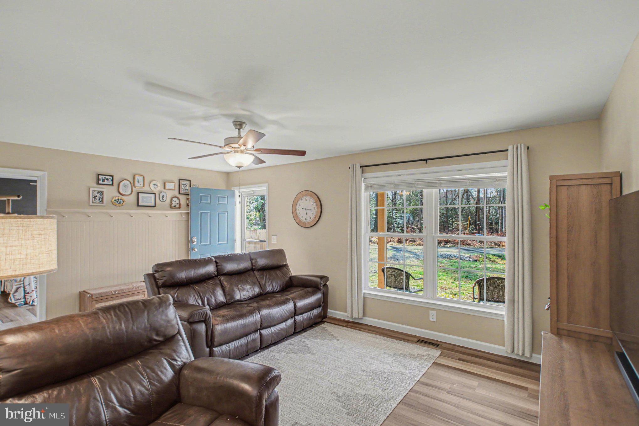 261 Azure Drive Colonial Beach, VA 22443 - Photo 8 of 44 Living room with charming entryway