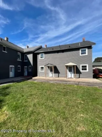 a house view with a outdoor space