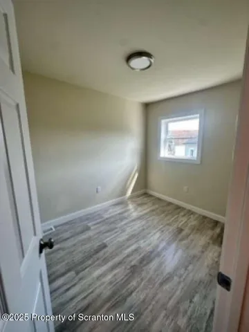 a view of empty room with window