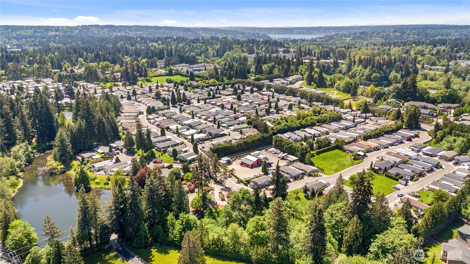 23825 15th Avenue Southeast, Unit 108 Bothell, WA 98021 - Photo 31 of 39 a view of a city with mountains in the background