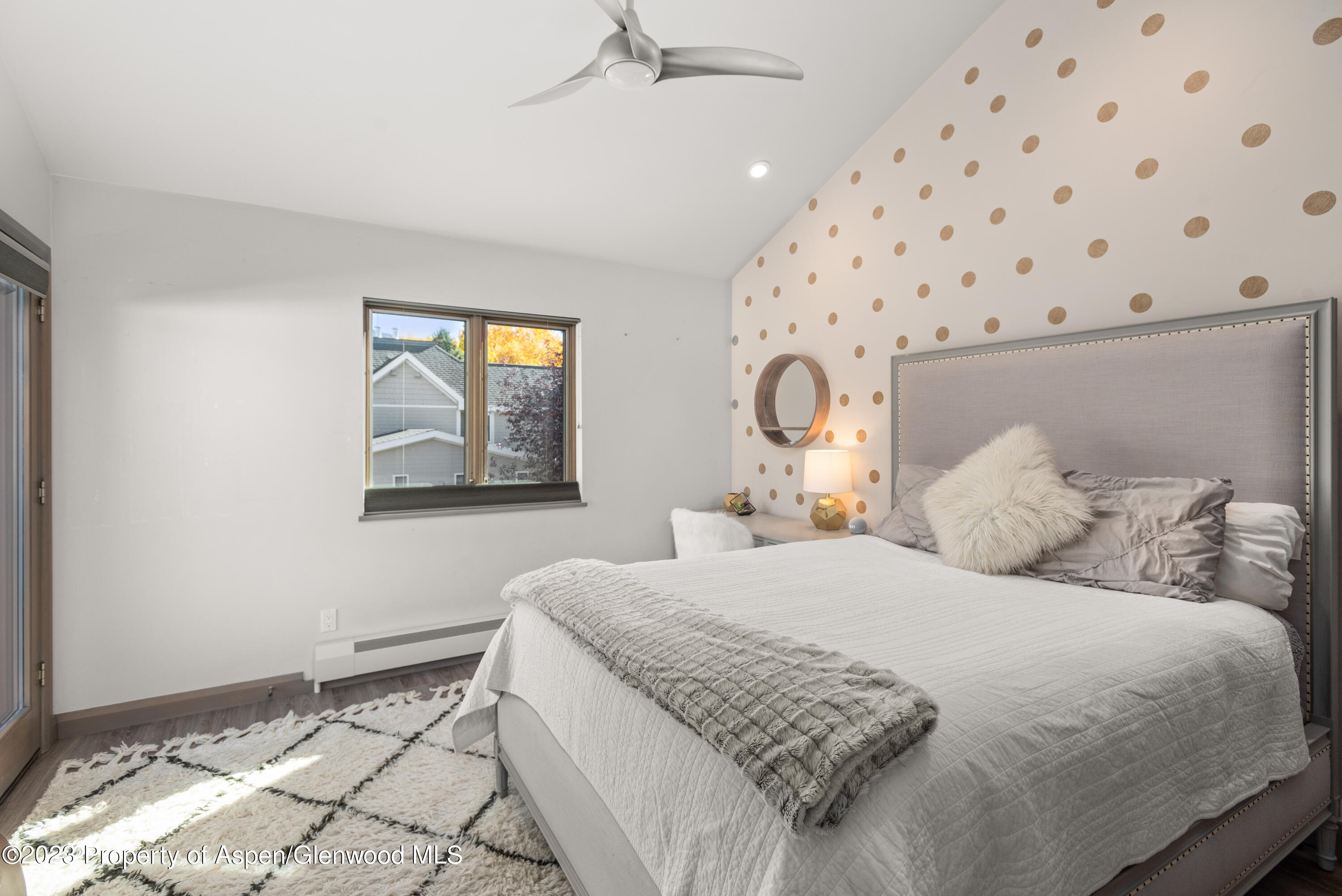 331 Branding Way Basalt, CO 81621 - Photo 15 of 28 a bedroom with a bed and a painting on the wall