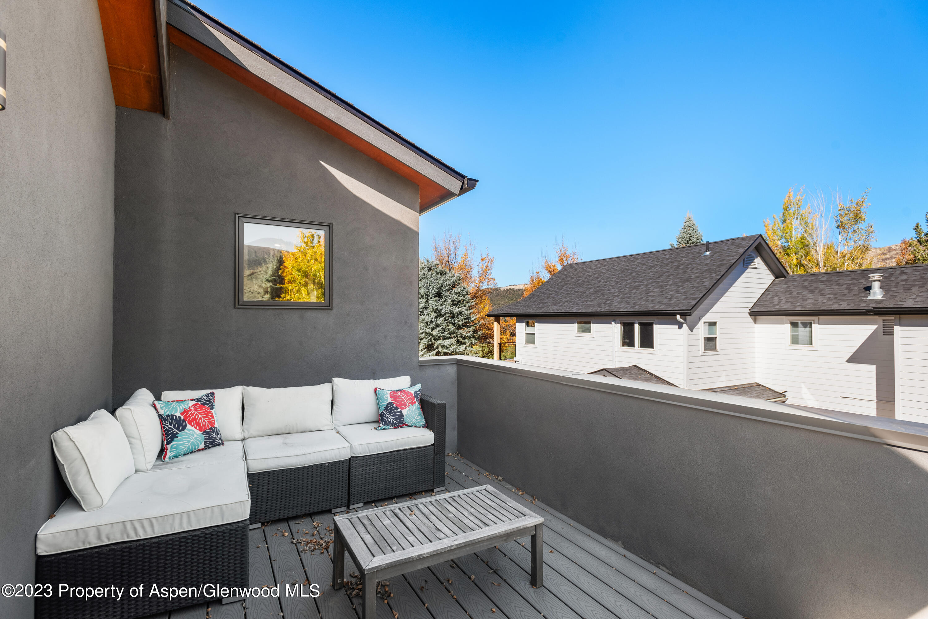 331 Branding Way Basalt, CO 81621 - Photo 17 of 28 a view of a terrace with couches and potted plants