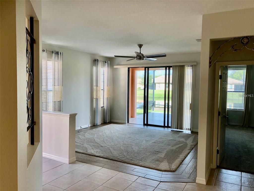 140 Shell Falls Drive Apollo Beach, FL 33572 - Photo 9 of 20 a bedroom with a bed and a mirror